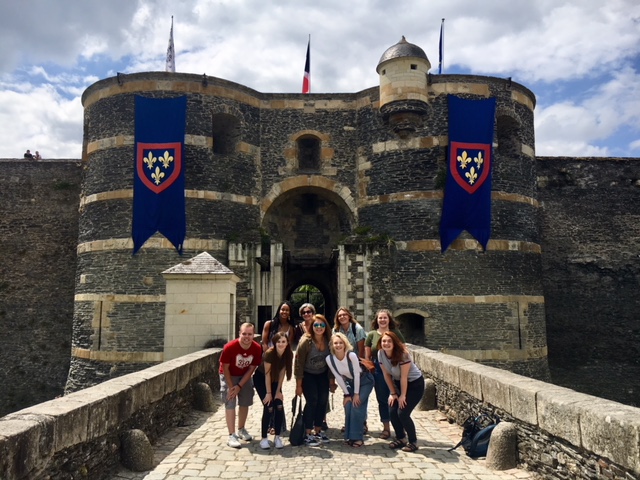 Students outside of castle in France.