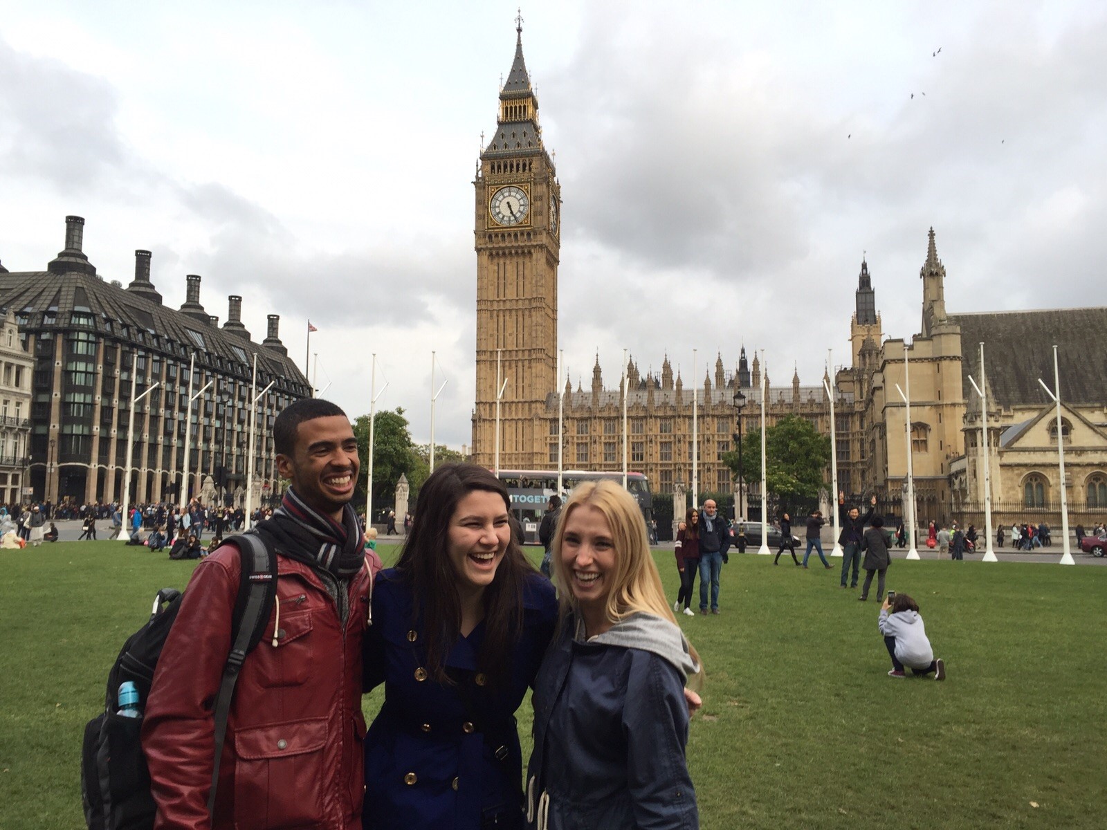 Students smiling outside of parliament building in London, England